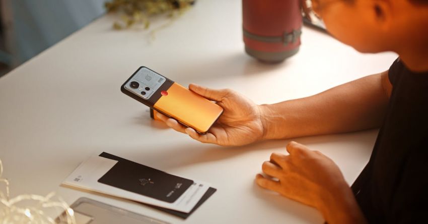 Brochure Design - A Man Holding a Cellphone